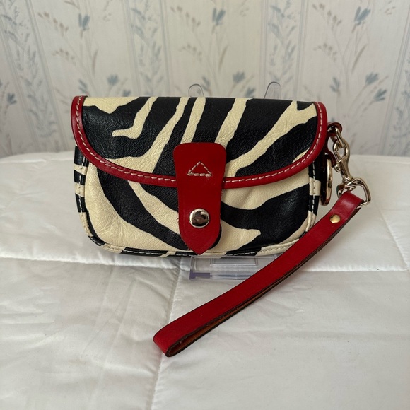 Dooney & Bourke Handbags - Dooney & Bourke Leather Zebra Wristlet with Red Trim